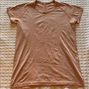Lululemon shirt; orangey-pink size L
